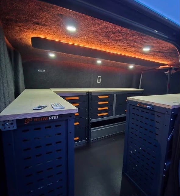 The inside of a van kitted out for a locksmith